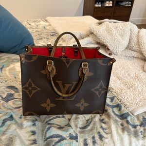 Louis Vuitton OTG MM, very good condition, minor peeling on wax strap edges.